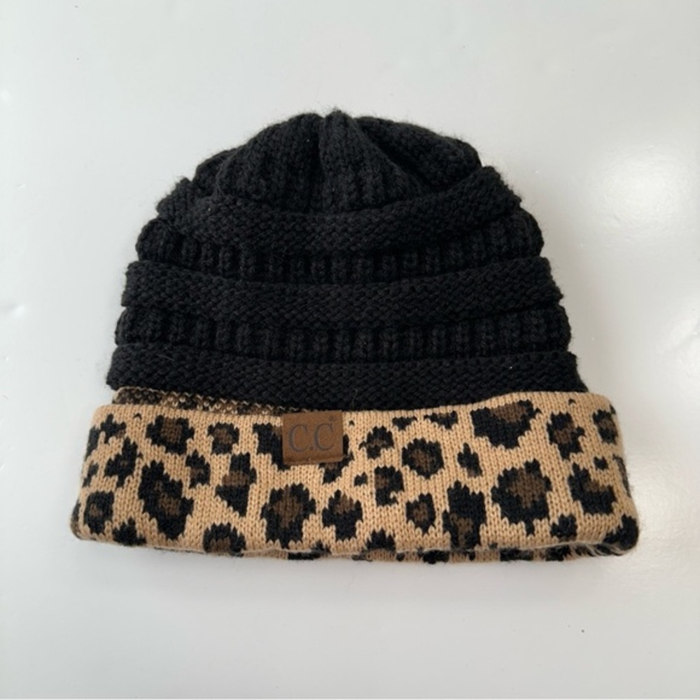 C.C Beanie Hat Stretch Cable Knit Ribbed Super Soft Animal Print Messy Bun Black